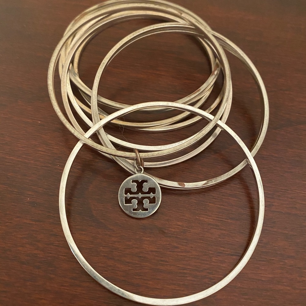 10 piece silver Tory Burch bangle set
